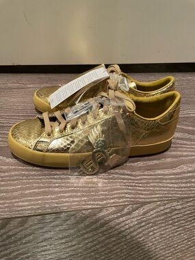 Adidas Originals Jeremy Scott Gold Metallic Low-Top Sneakers Gold Rod Laver